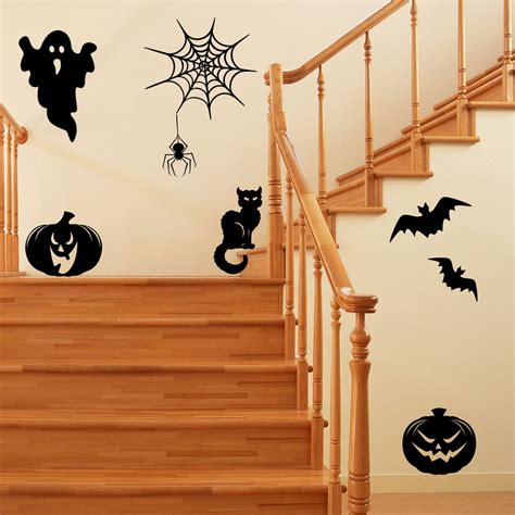 (It helps to have a friend to help with the cutting but it is not necessary. . Halloween wall decals